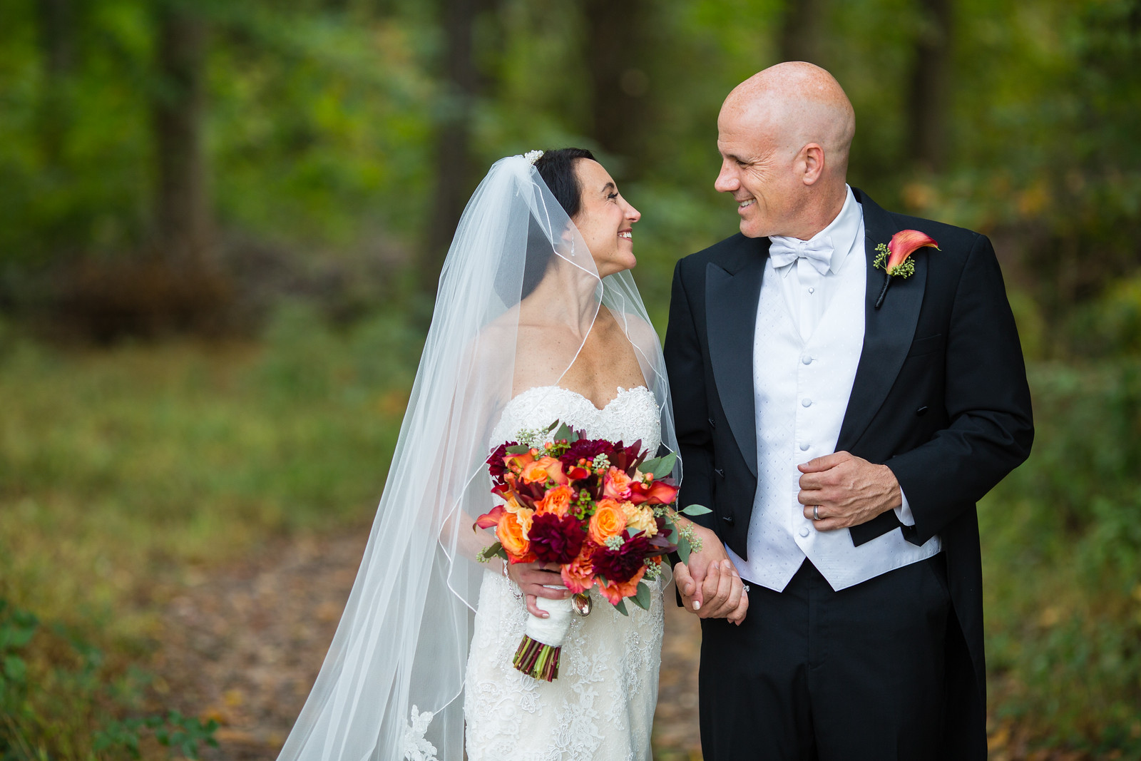 bride and groom outdoor fall wedding ceremony by perfect planning events