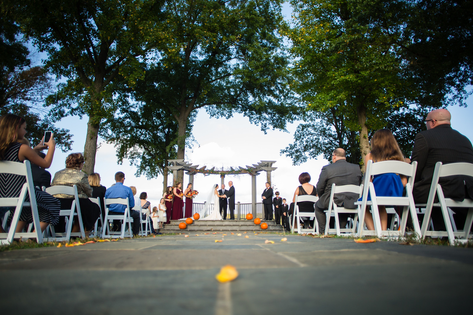 outdoor fall wedding ceremony by perfect planning events